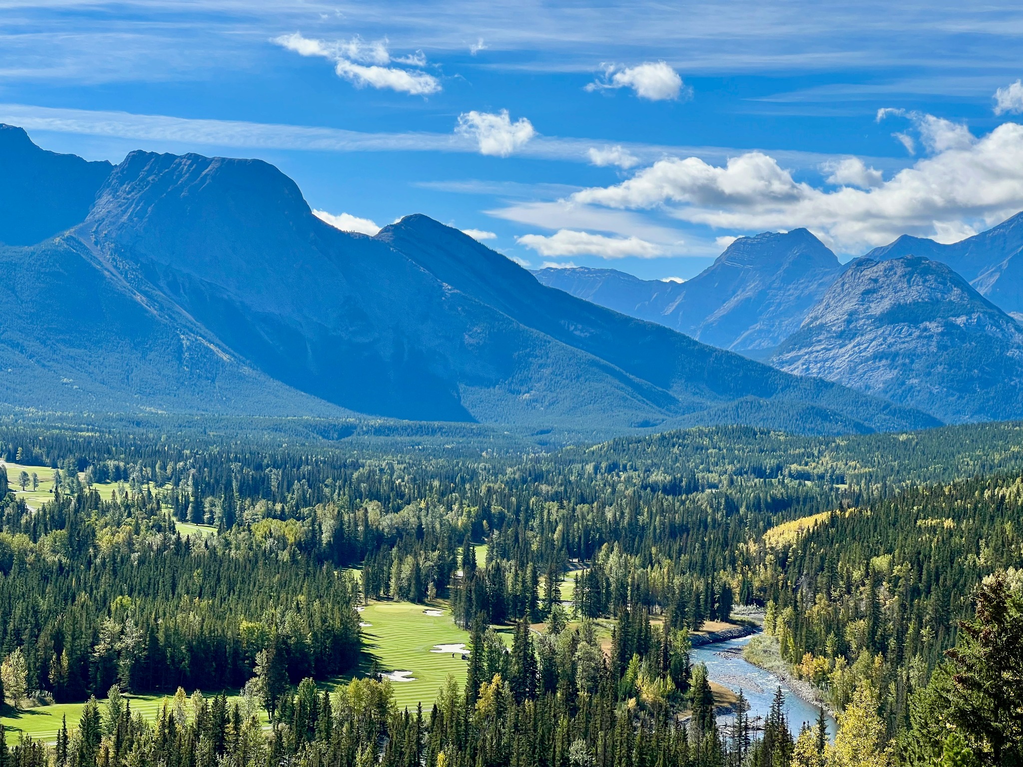 Golf course in a mountain valley